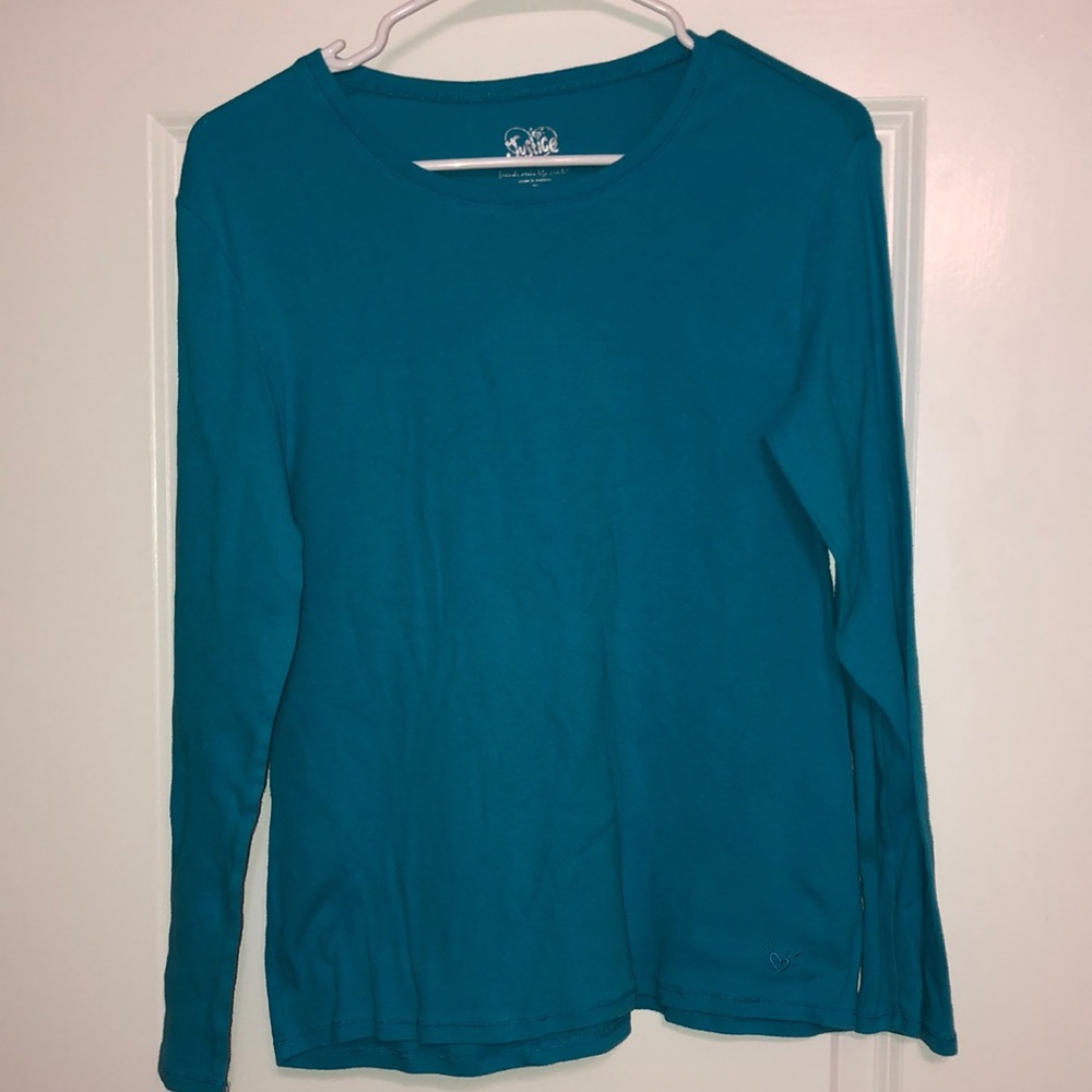 This blue Justice top is a kids size 20.